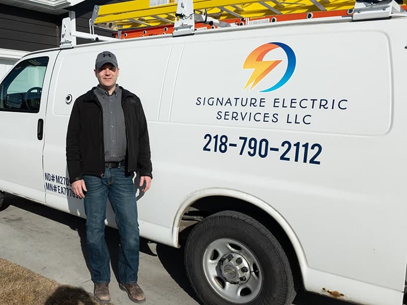 matt johnson standing in front of customer home